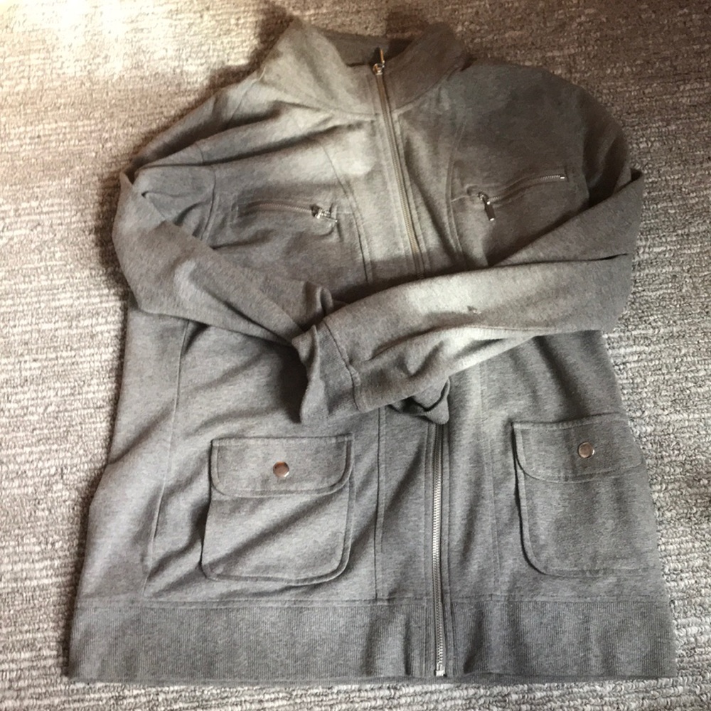 A light grey zip up